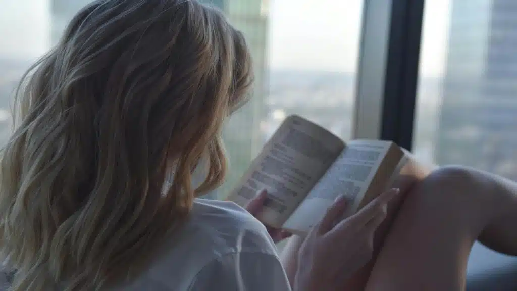 A woman reading at home