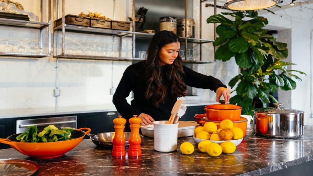 A woman cooking by herself