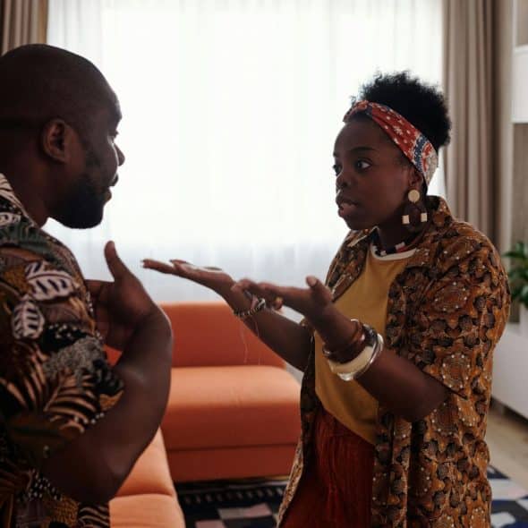 A man and woman arguing