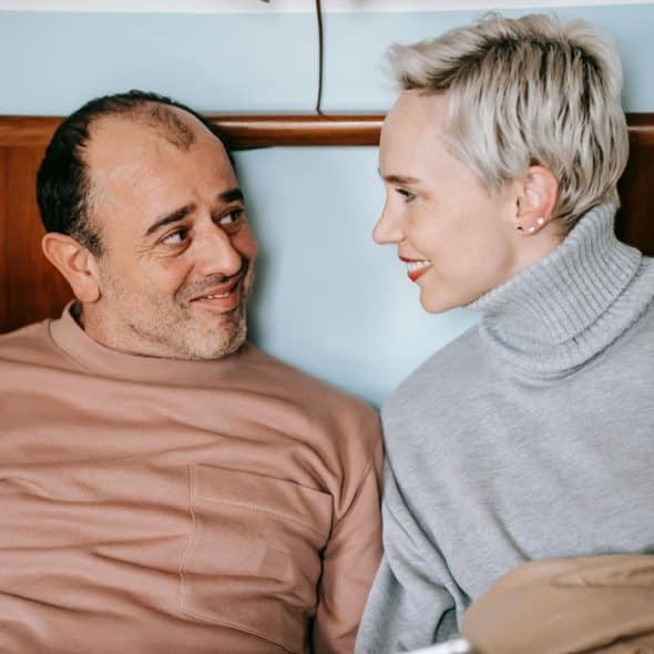 A man and woman looking at each other