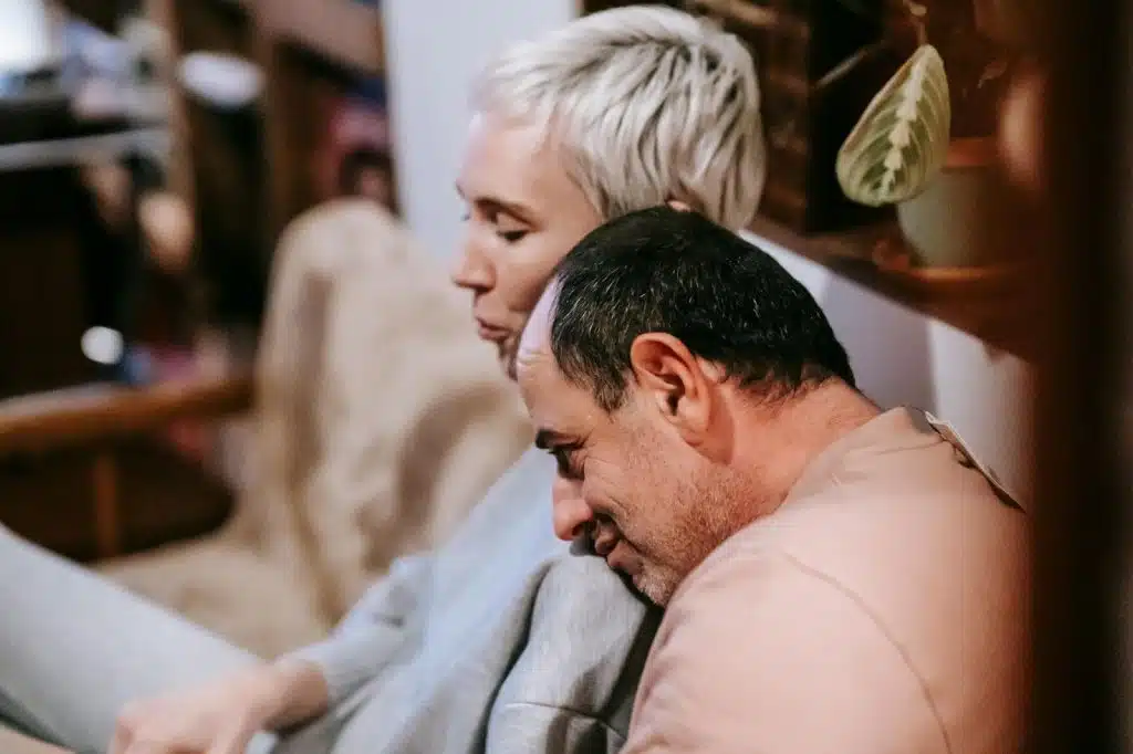 A man and woman being sweet together