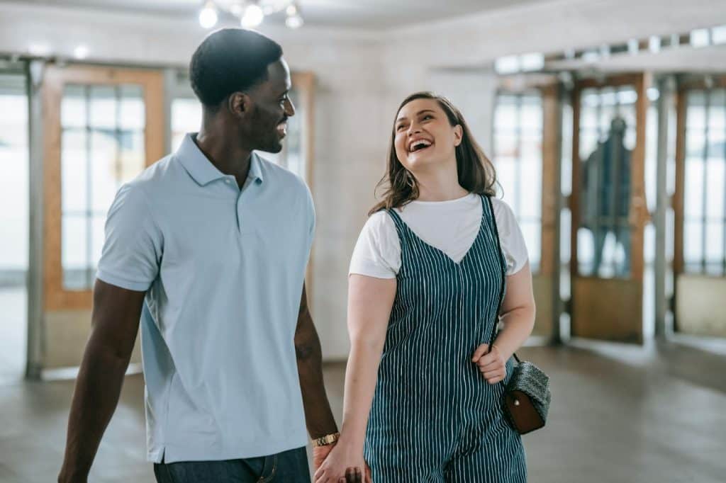 A man and woman laughing together
