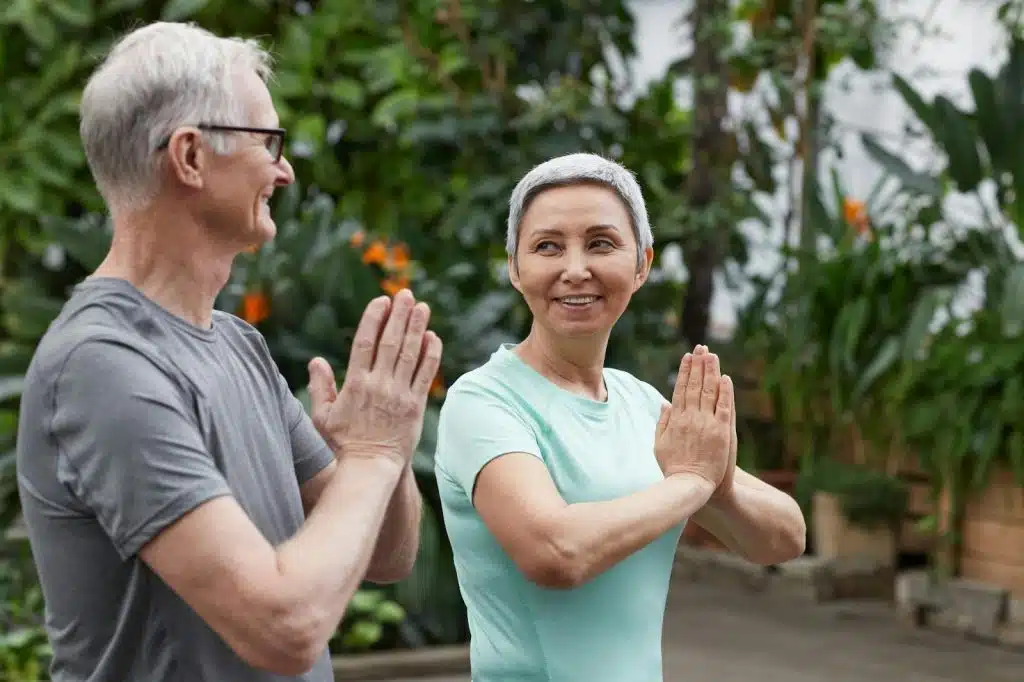 A man and woman smiling at each other