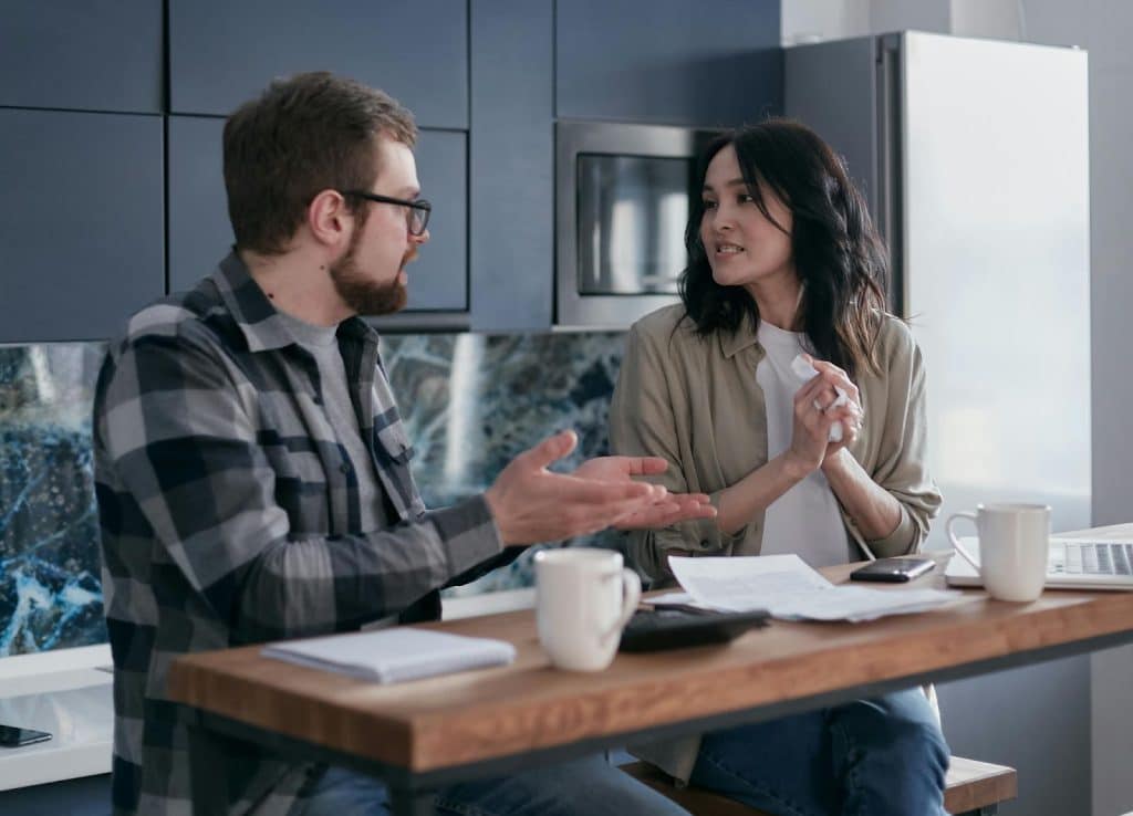 A man and woman arguing