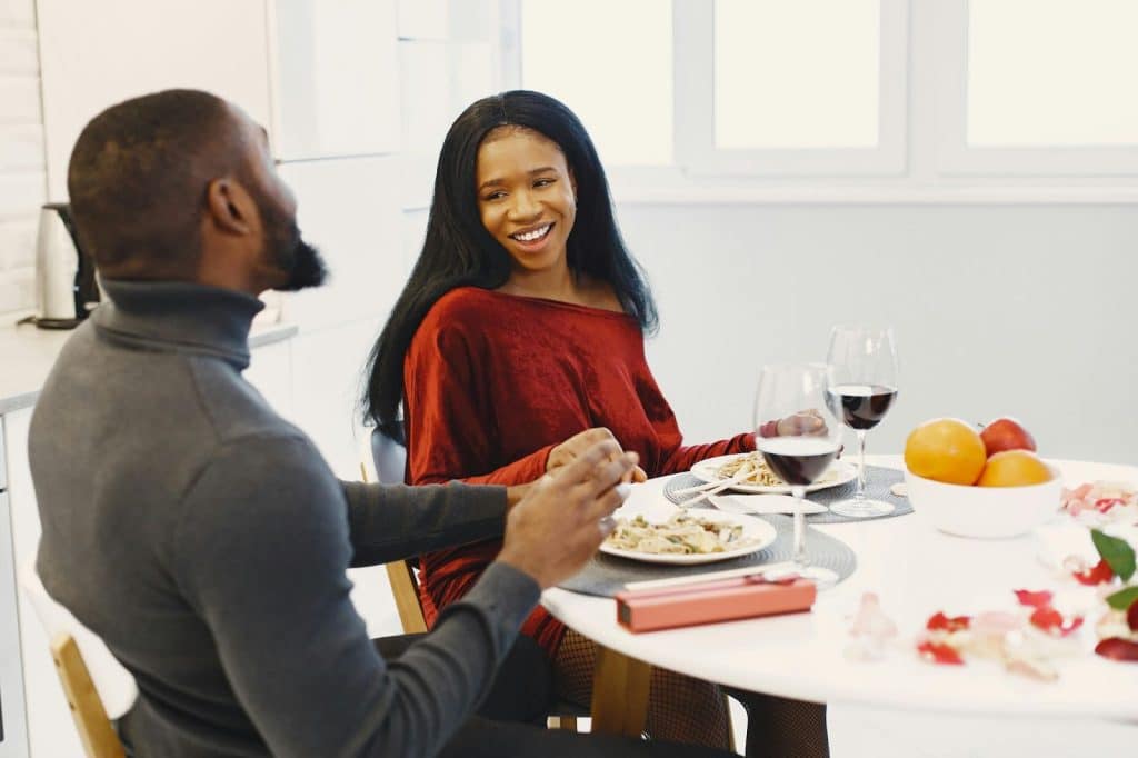 A man and woman talking