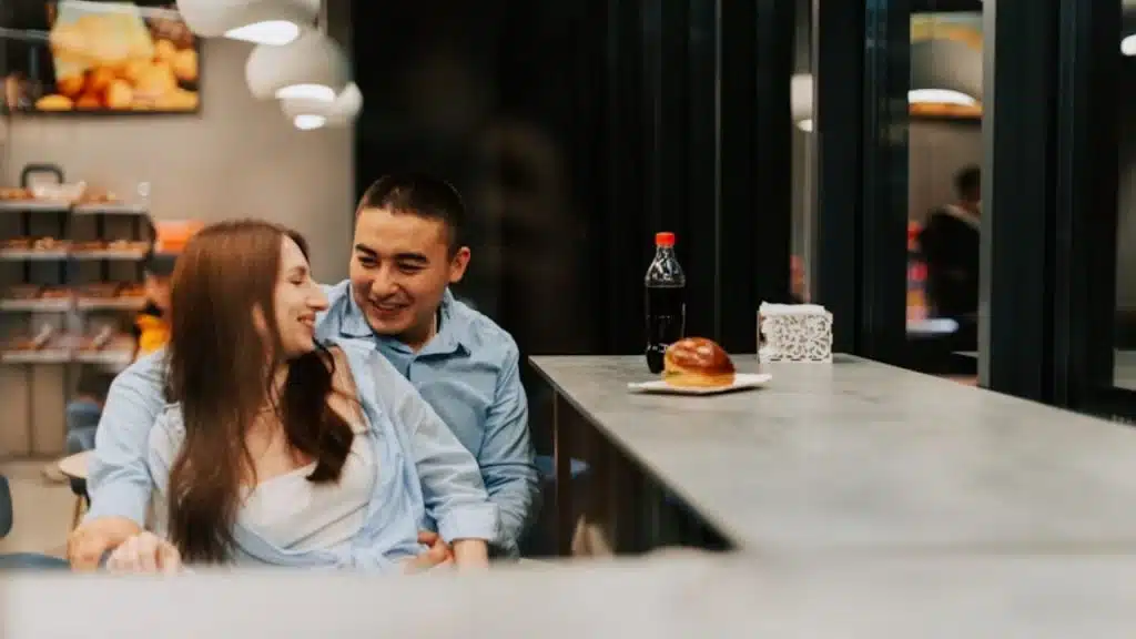 Man noticing body odor while sitting near from his date