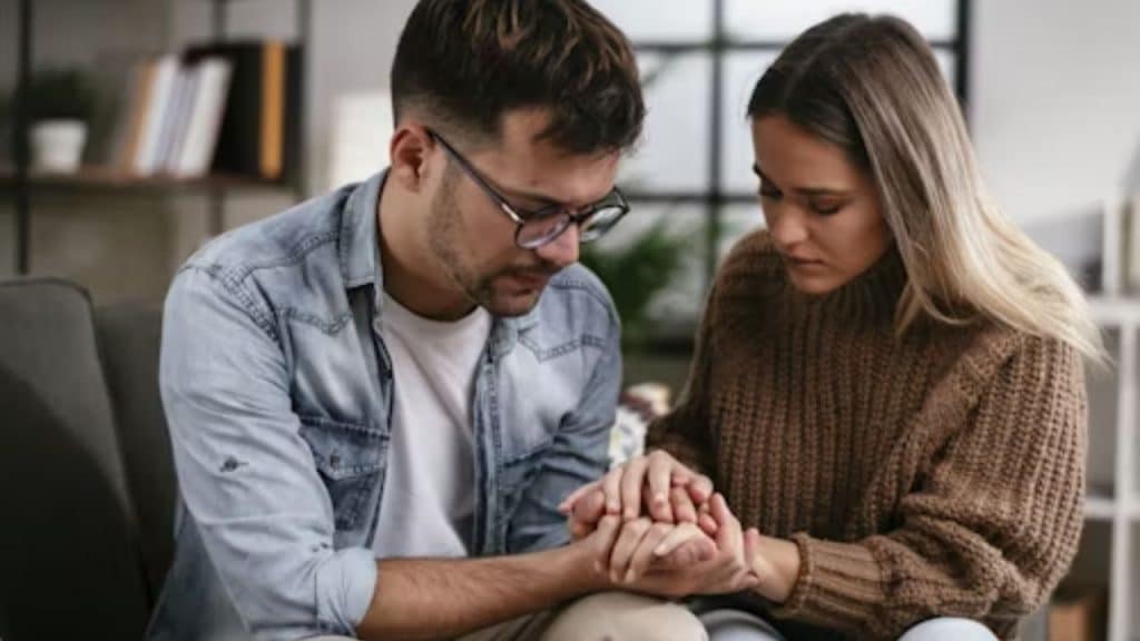 A man and a woman feeling tired of their relationship