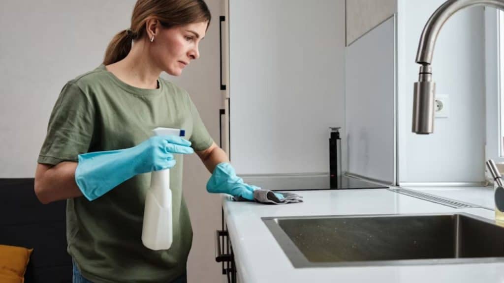 Woman feeling down after doing all the house chores