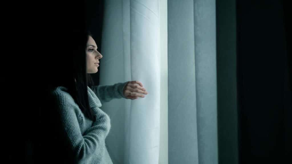 A woman looking out the window