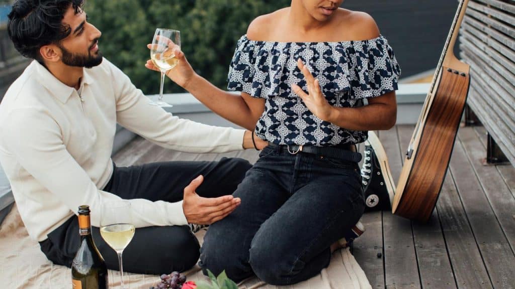 A woman clearly denying a man’s romantic gesture.