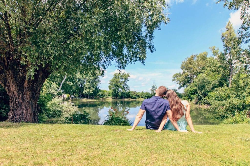 A man and woman at the grass