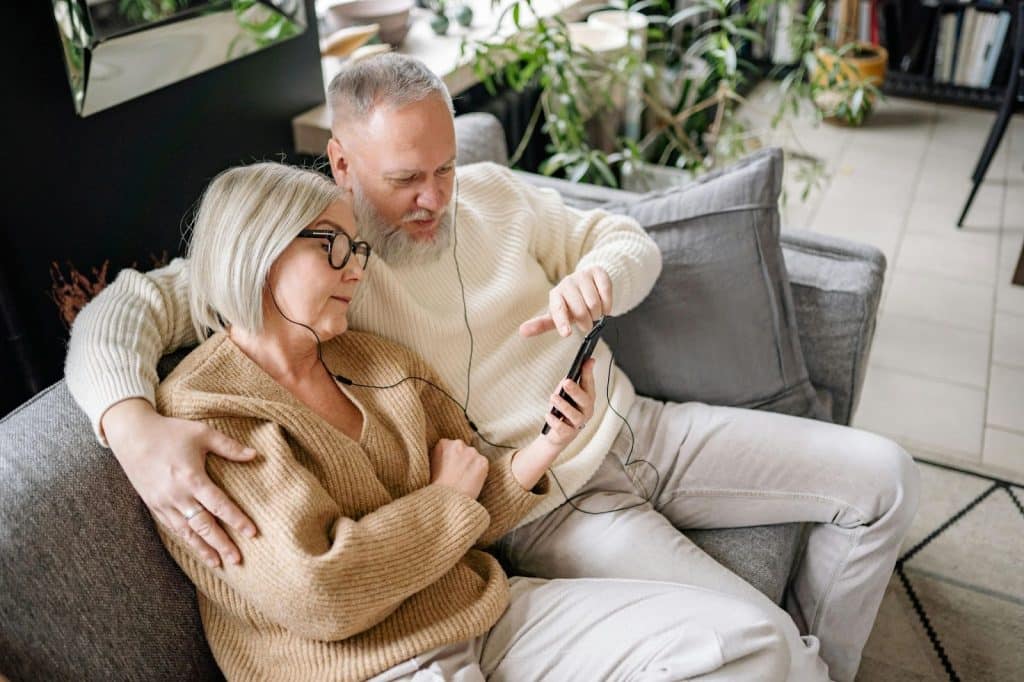 A man and woman at the couch