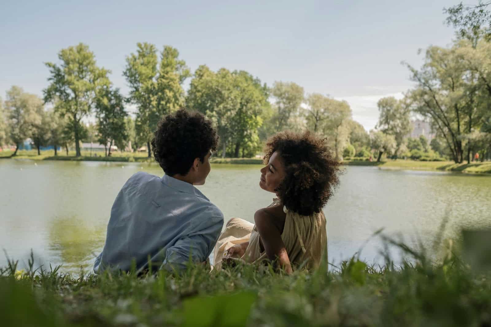 A man and woman looking at each other.
