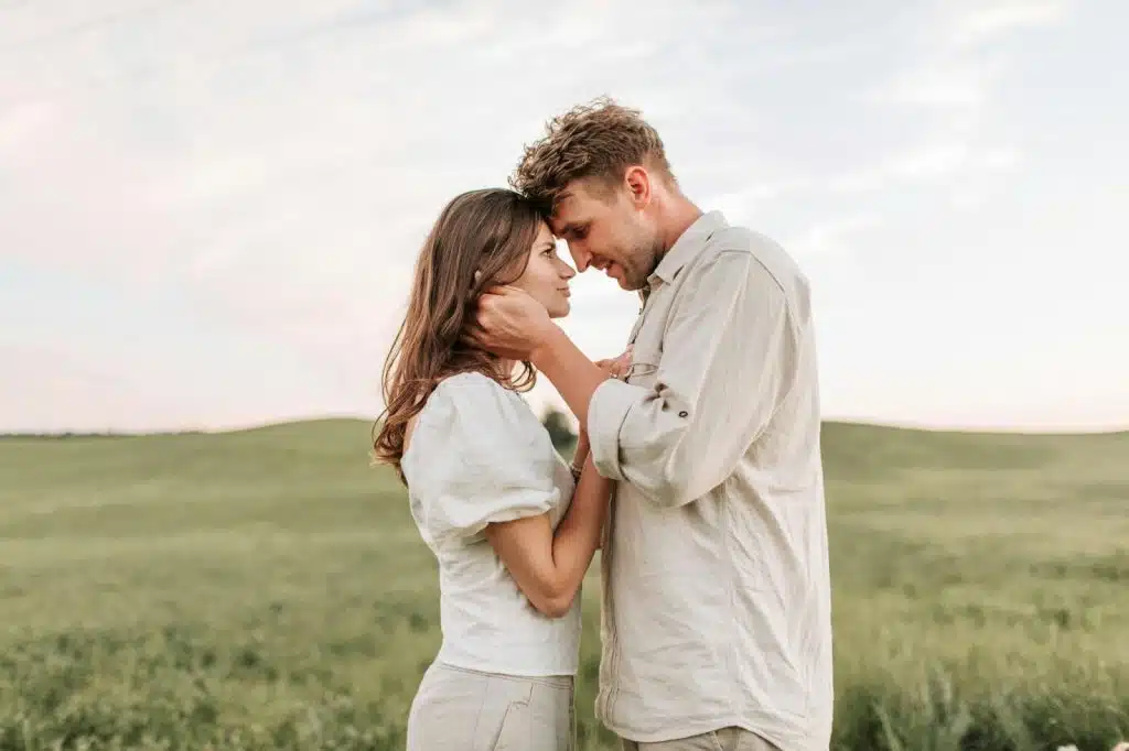 A man and woman facing each other