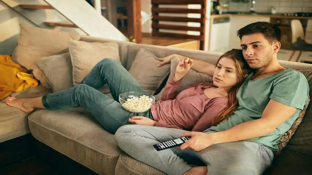 A couple choosing a TV show