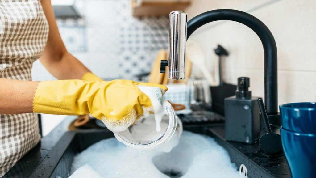 A woman washing the dishes