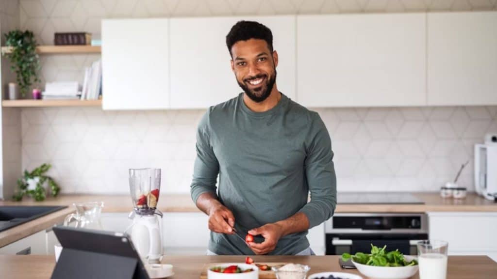 Man preparing a healthy meal in the kitchen