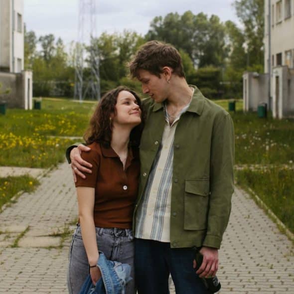 A man and woman looking at each other