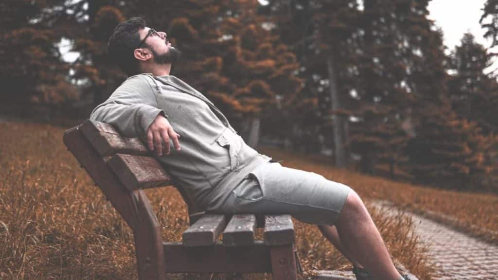 Man practicing deep breathing outdoors
