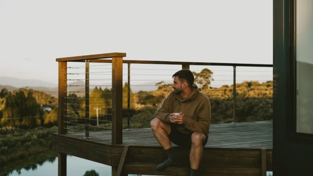 Man peacefully enjoying coffee alone