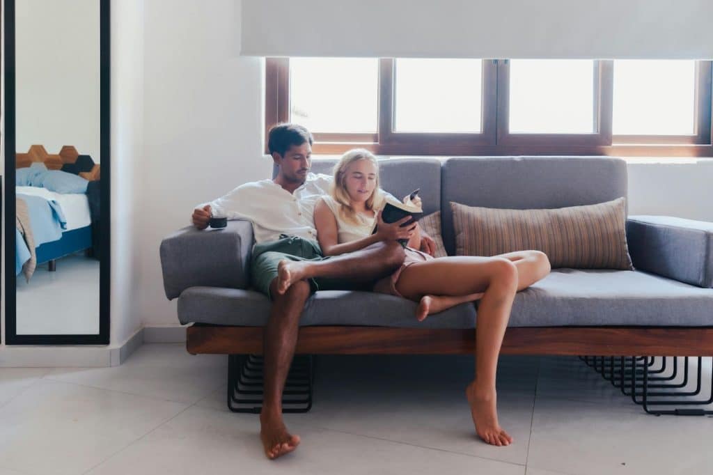 A man and woman at the living room 