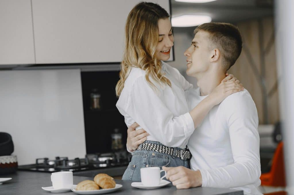 A man and woman looking at each other