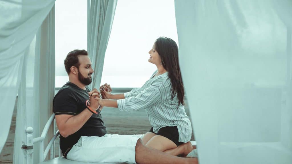 A man and woman holding hands