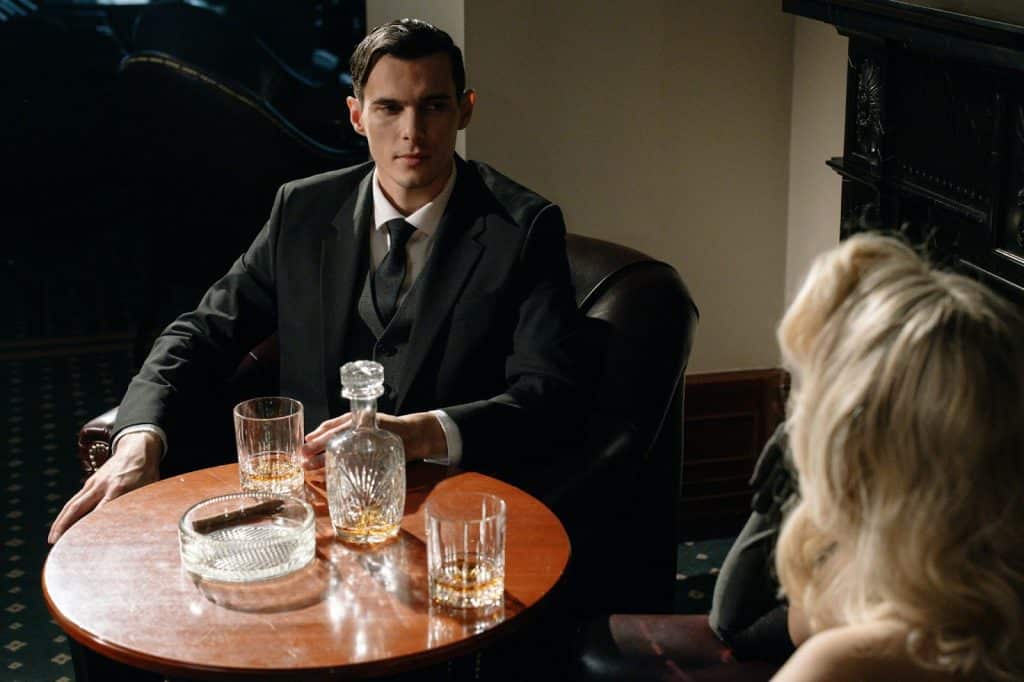 A man talking to a woman