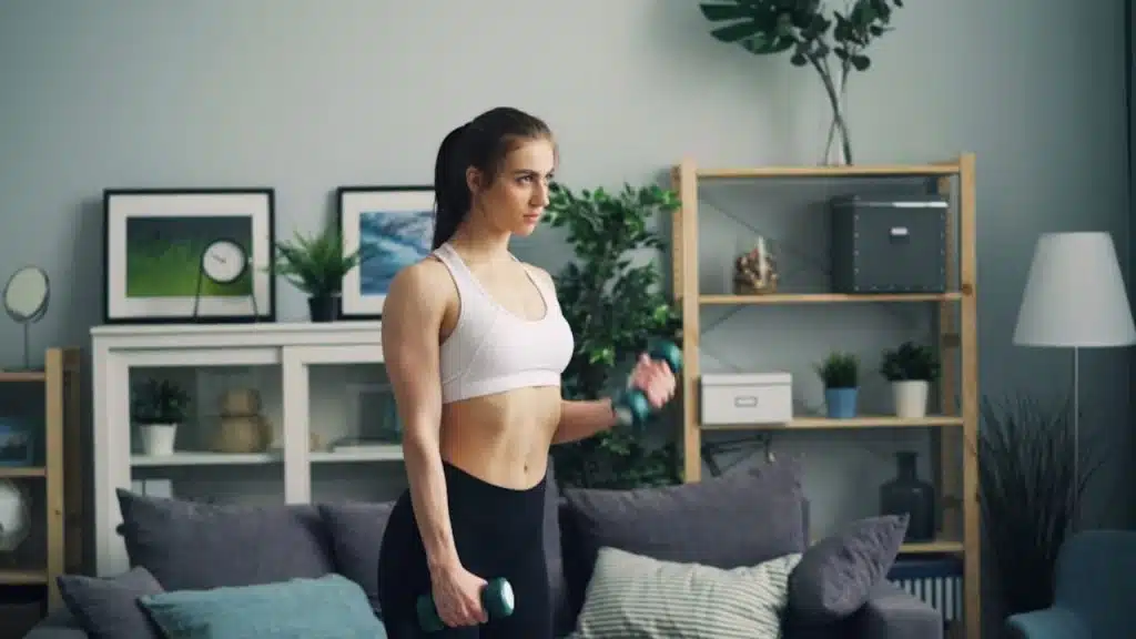 A woman working out alone at home