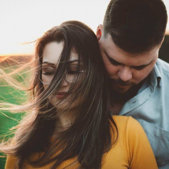 A man and woman close together