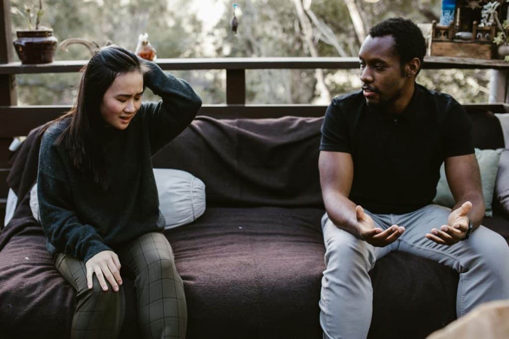 A man and woman arguing