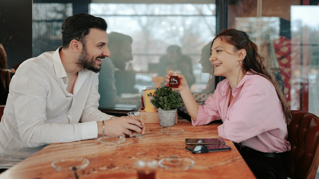 A couple smiling during their date