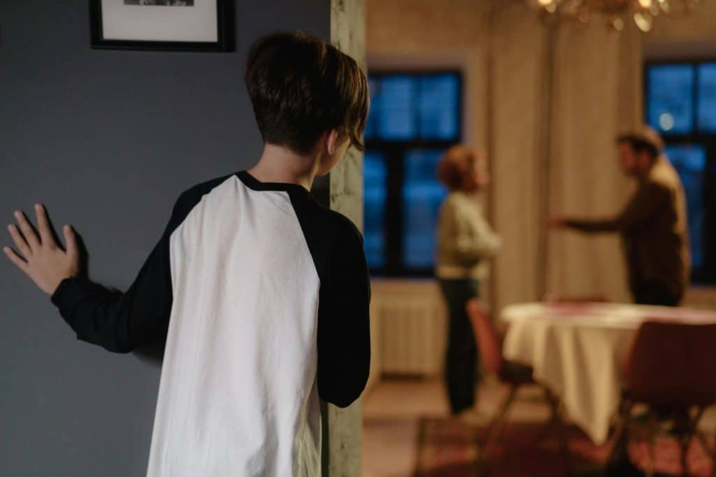 A child watching his parents fight