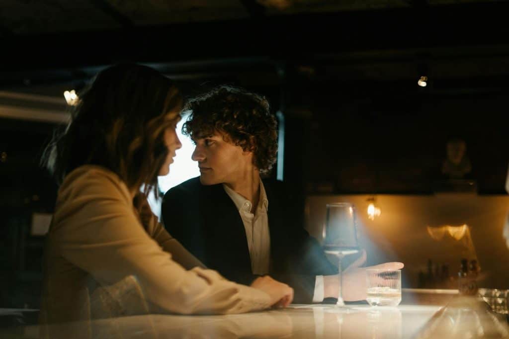 A man and woman at the bar