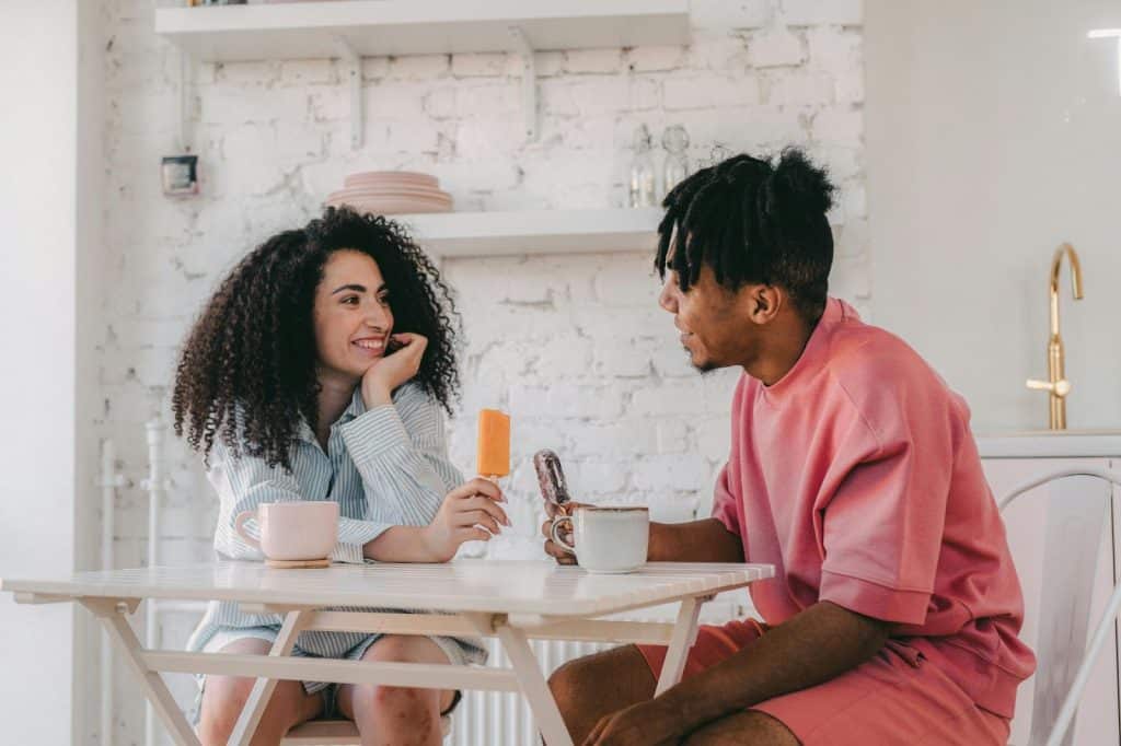 A man and woman looking at each other