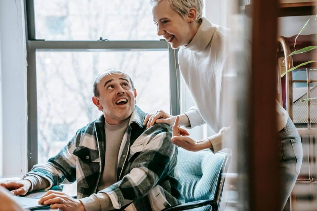 A woman encouraging a man