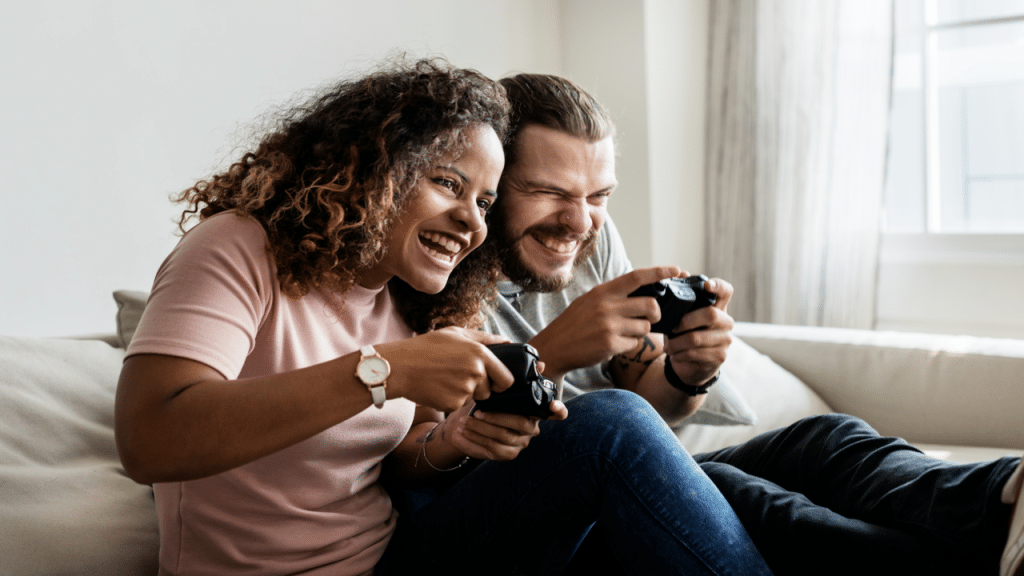 A couple playing a video game together