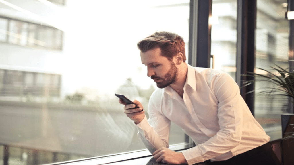 A man checking his phone