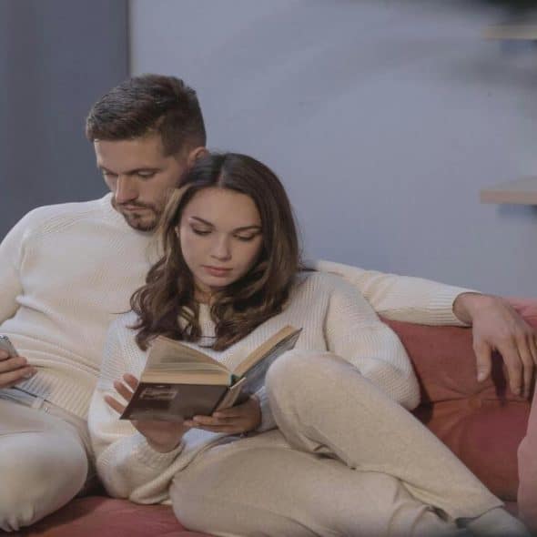 A couple relaxing at home