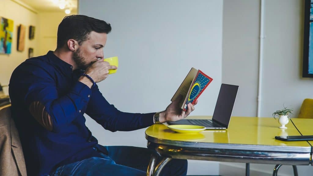 A man reading by himself