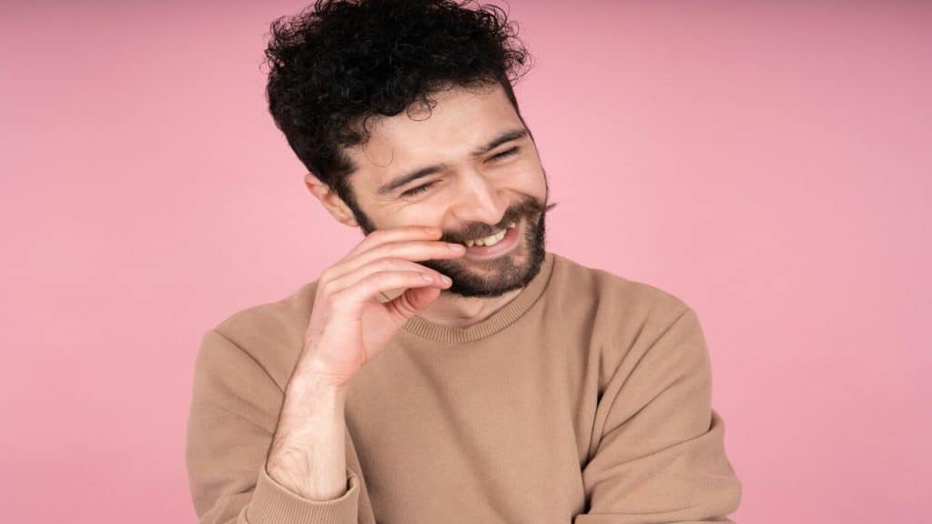 A man laughing by himself