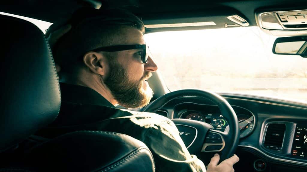 A man driving by himself