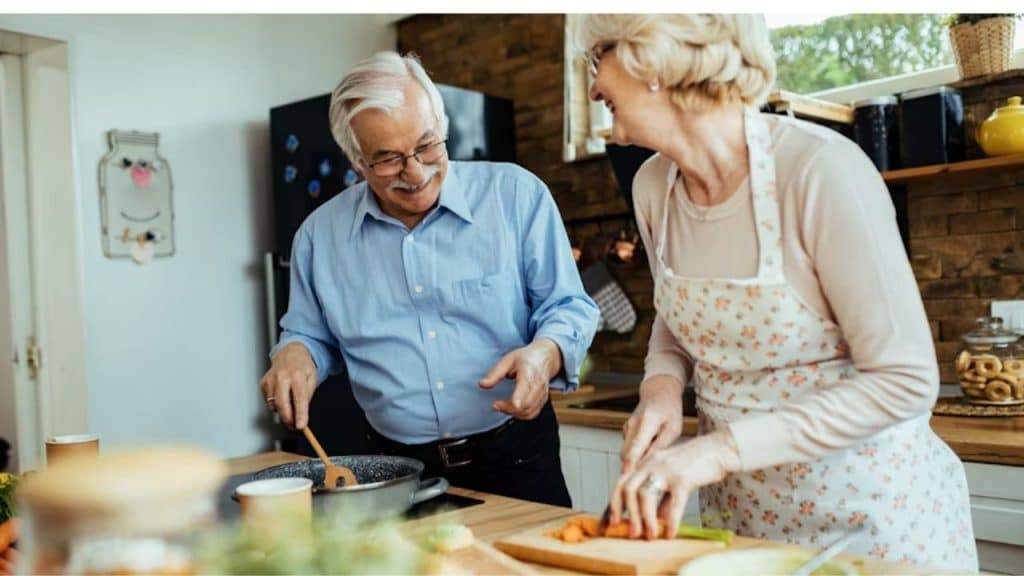 A couple preparing a healthy meal together in a modern kitchen