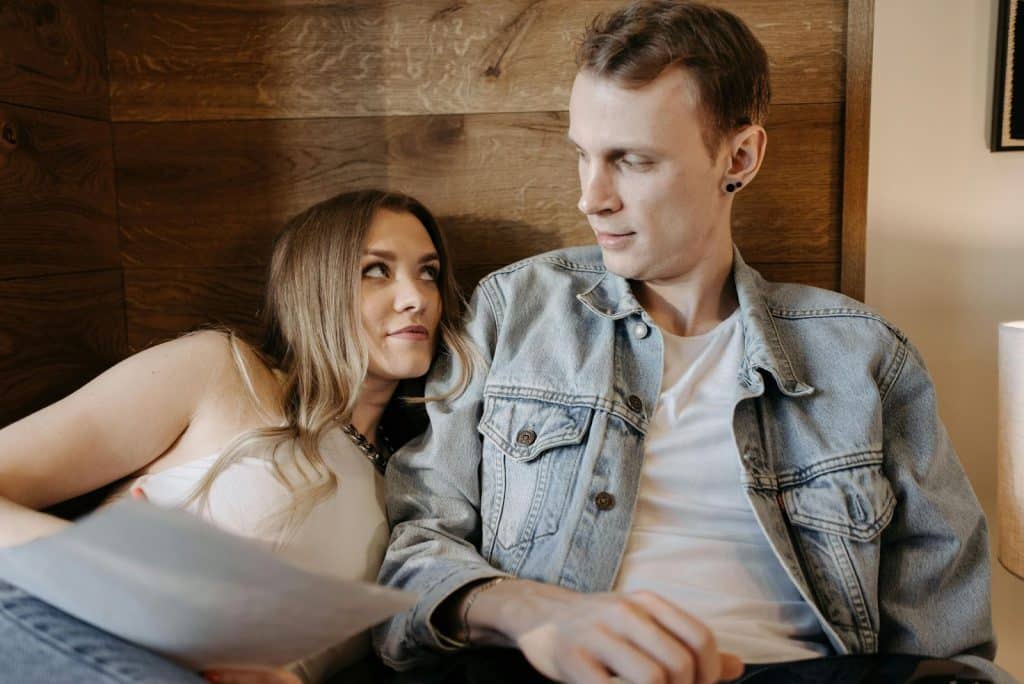 A man and woman looking at each other