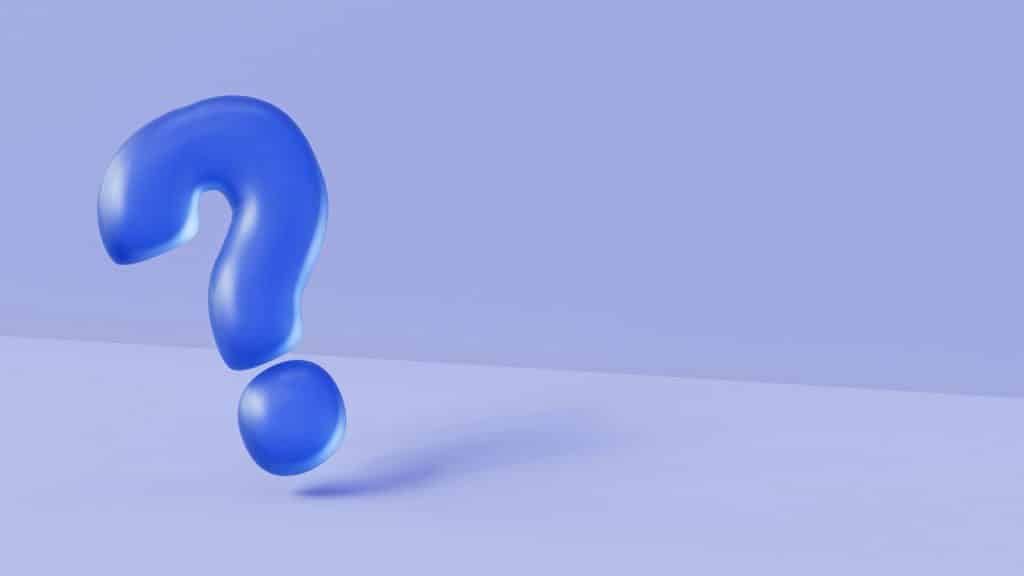 A glossy blue 3D question mark on a light lavender background.