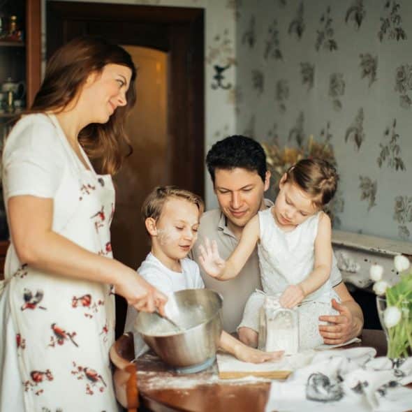 A man and woman with their kids