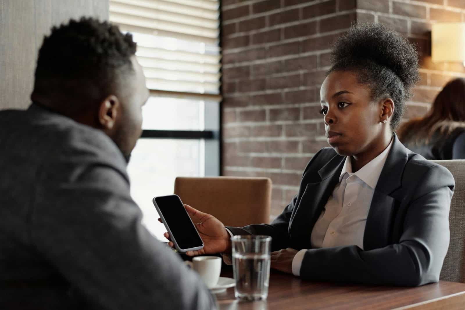 A man and woman talking.