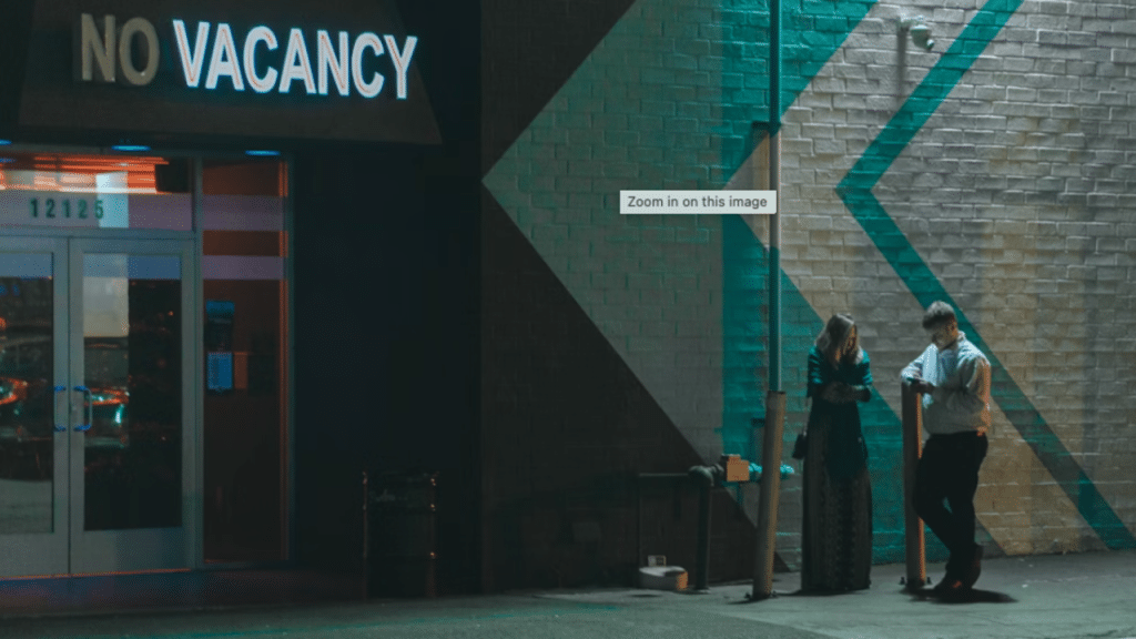 A couple waiting for a taxi