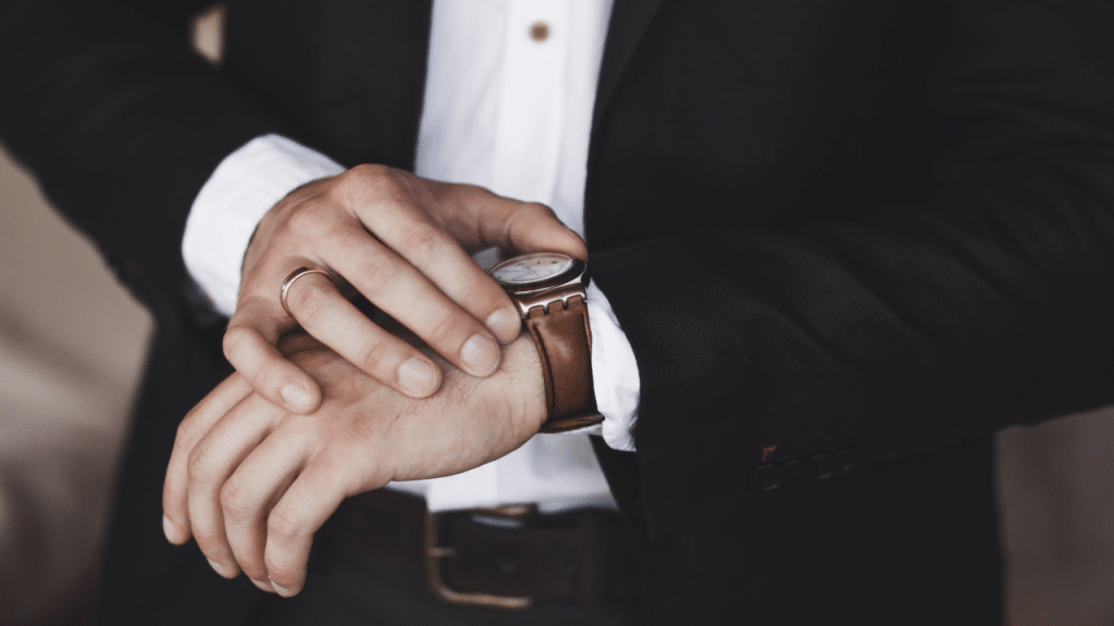 A man checking the time