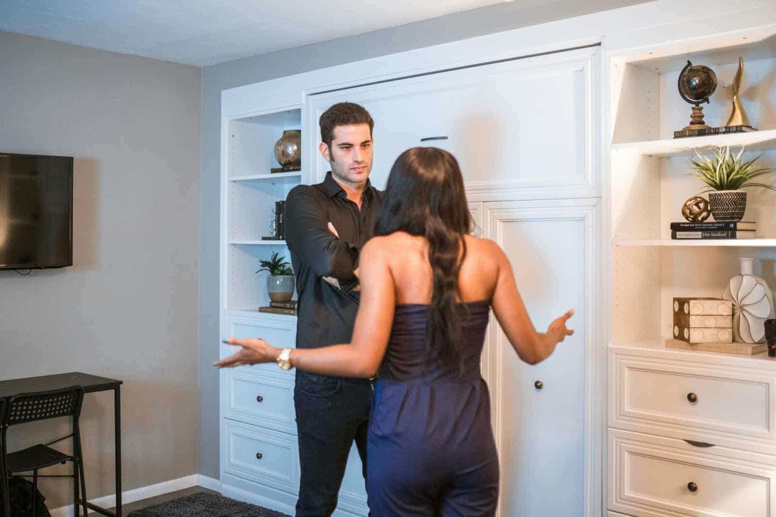 A man just silent while a woman nagging him.
